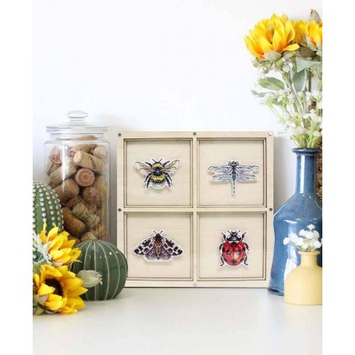 Covered frame for magnets for decorating embroidery